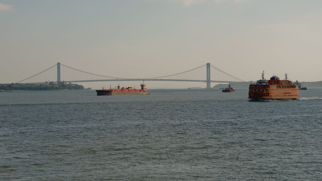 The Verrazzano-Narrows Bridge and a Staten Island Ferry seen across the Narrows, New York