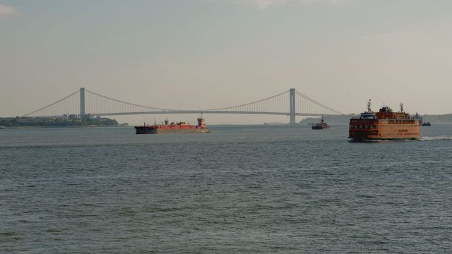 The Verrazzano-Narrows Bridge and a Staten Island Ferry seen across the Narrows, New York